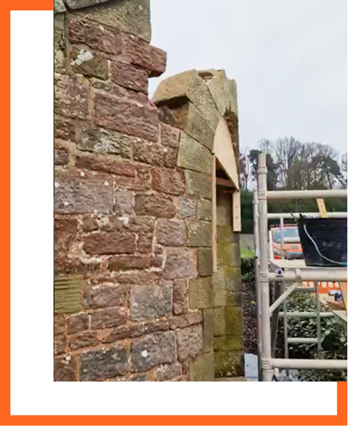 Side view of sandstone arch under construction