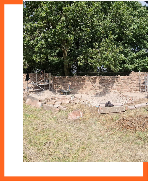 Boundary wall being reassembled